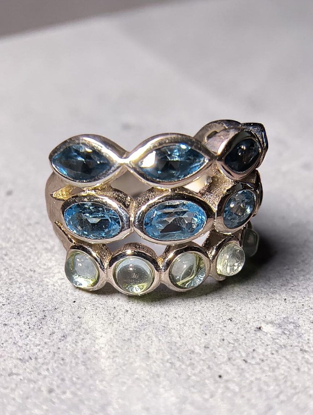 Three Row Mixed Blue Topaz Ring In Sterling Silver